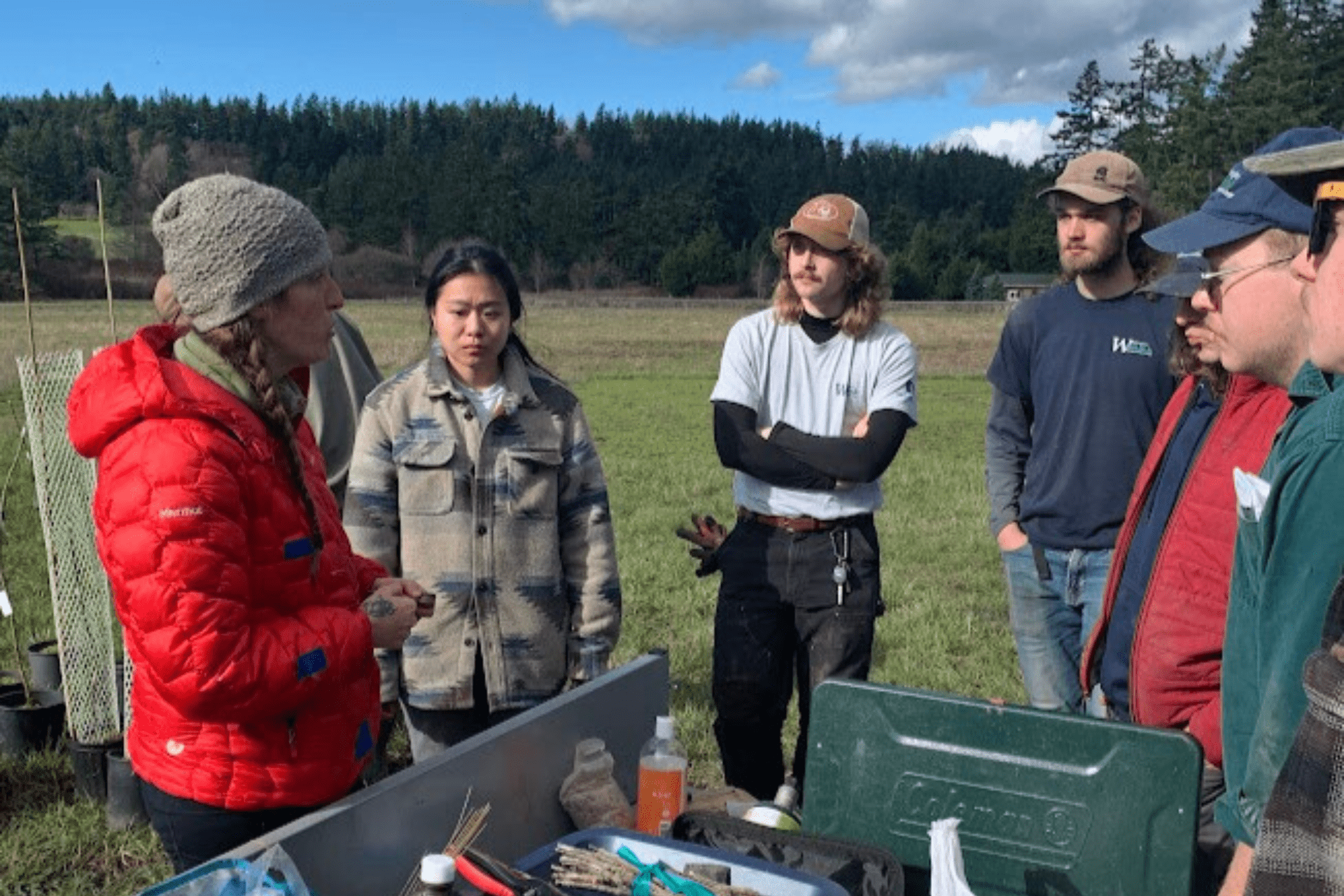 Kelsi Mottet speaking with fellow conservationists.